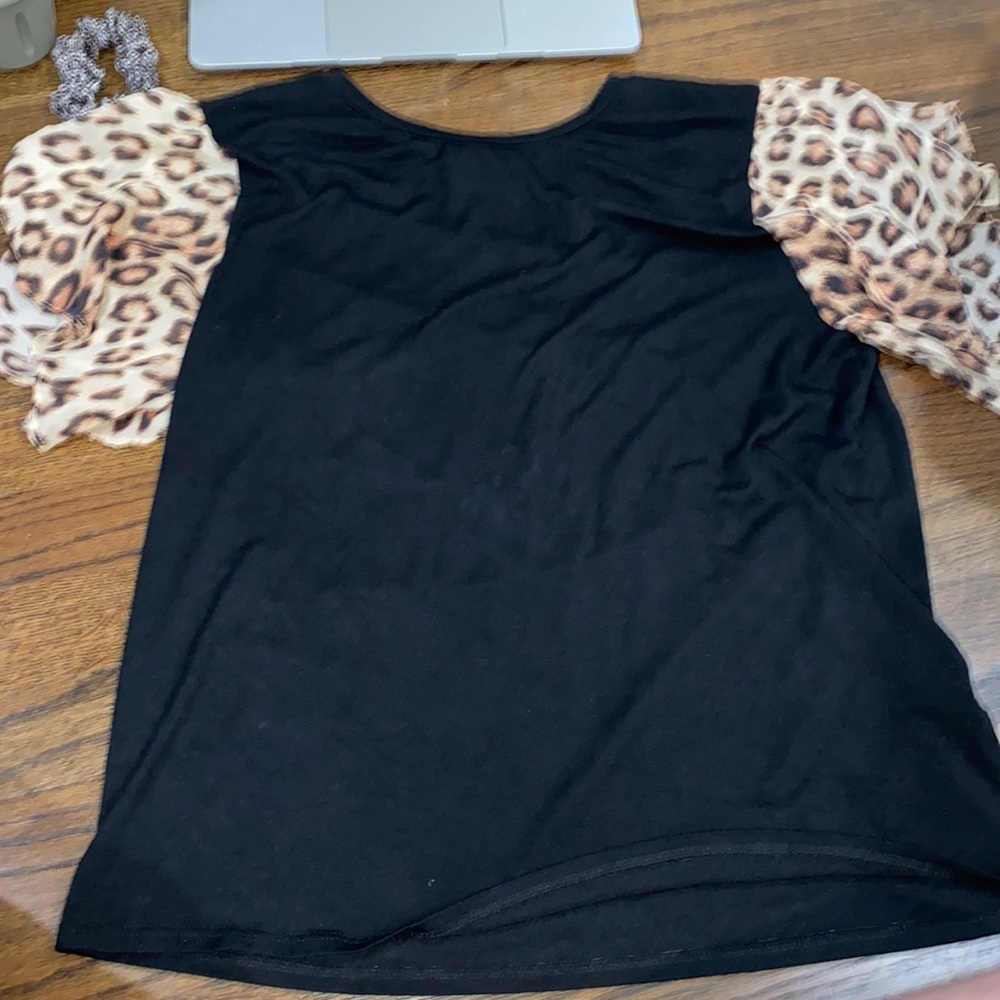 black tee shirt with cheetah sleeves
